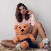 With her teddy