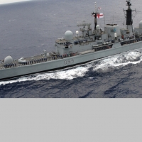 WORLD OF WARSHIPS  HMS MANCHESTER RENDERING HONOURS TO THE USS HARRY S TRUMAN