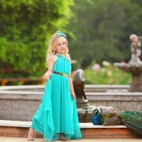 Little girl and peacock