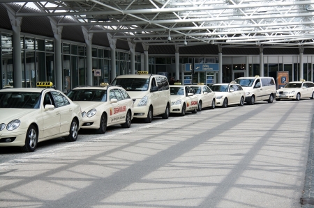 At the Airport - taxi, waiting, cars, airport