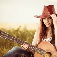 Cowgirl With Her Guitar