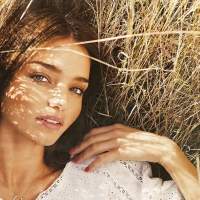 Cowgirl In The Hay Field . .