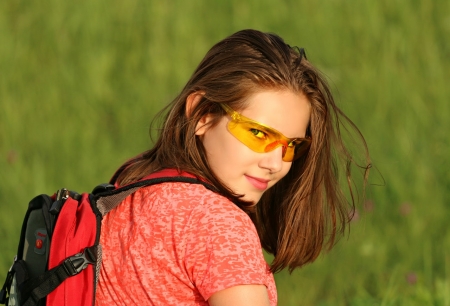 Girl with backback - woman, people, glasses, girl, orange, backpack