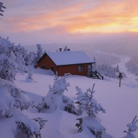 Winter House at Sunset