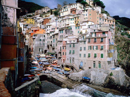 Riomaggiore, Italy - boats, jetty, houses, italy