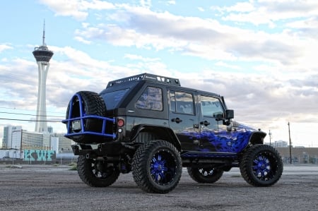 2012-Jeep-Wrangler - blue accents, mopar, lift, black