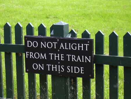 Train Sign - sign, writing, grass, fence, england, train, nature, message, green, field