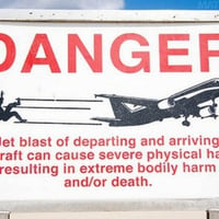 Maho Beach Warning Signs