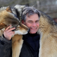 Animal trainer with his wolf