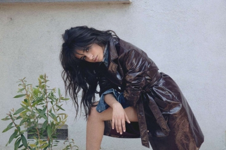 Camila Cabello - vent, denim top, long hair, leather coat, brunette, plant