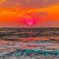 Fiery Sea Sunset and Foamy Surf