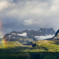 Amazing Rainbow in Snowy Mountain