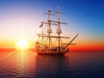 pirate ship in the sea at sunset