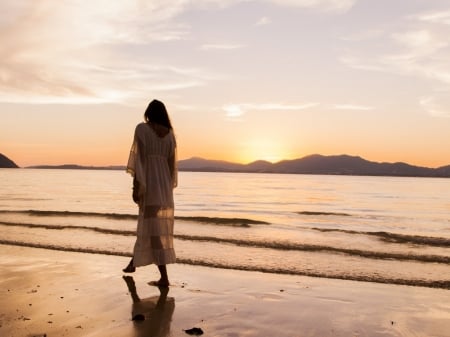 A walk by the seaside - water, seaside, lady, sand