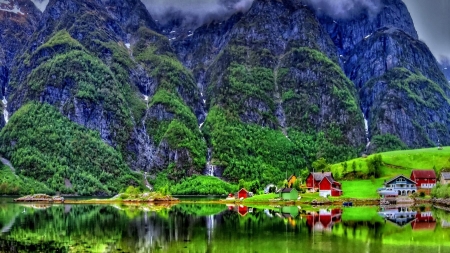 Colorful Emerald Lake - lakeshore, slope, lake, houses, greenery, mountains, mist, nature, reflection, emerald, cabin, cliffs