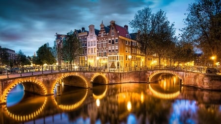 Bridge over Keizersgracht Canal, Amsterdam, Holland - trees, night, light, reflection, nature, canal, houses, sky, bridge