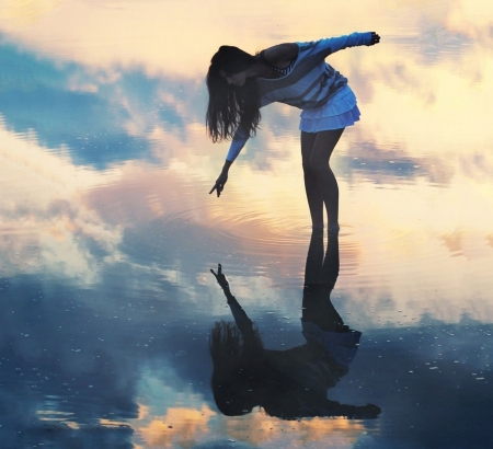 Reflection - at the beach, beach, peering into her own reflection, Brunette, short white skirt and top