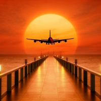 Airplane Takeoff During Sunset