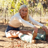 Cowgirl Touching Her Toes