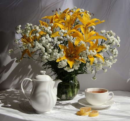 Still life - teapot, flowers, cup, vase