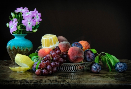 Still life - lemon, fruits, flowers, berries, vase