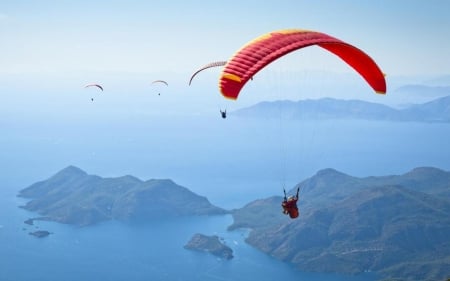 Paragliders in the Sky - sky, paragliders, landscape, sea