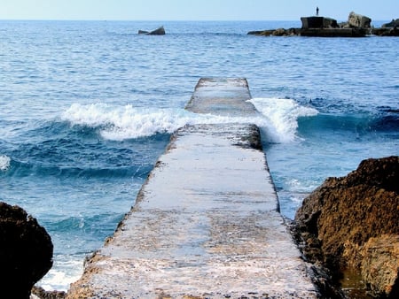 To go or not to go - stone, pier, sea