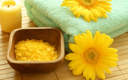 Spa concept - salt, towel, flowers, bowl