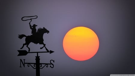 Big sunset behind wind vane - cowboy, sun, weather vane, sunset, wind vane