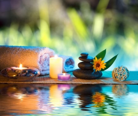 Spa background - candles, flower, water, stones