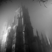 Shadowy gothic castle in the mist