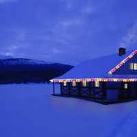 Lighted House on Winter Night