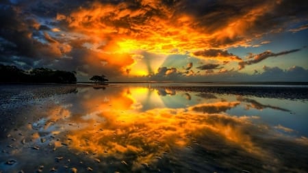 Reflection of a Sunset with a Sunbeam