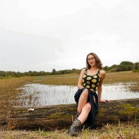 Cowgirl On A Log . .