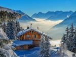 Cabin in the Winter Mountains