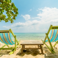 Sandy Beach with Sunloungers