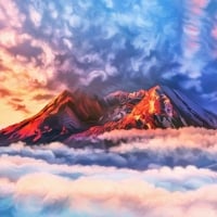 Mountain Peaks Above the Clouds