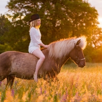 Cowgirl at Sunset