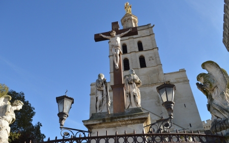 Cathedral in Avignon, France - cathedral, sculptures, Mary, tower, lanterns, crucifix, John, Jesus