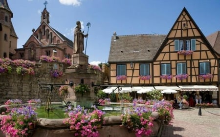 Town in Alsace, France - france, town, flowers, house, sculpture, church, alsace, fountain