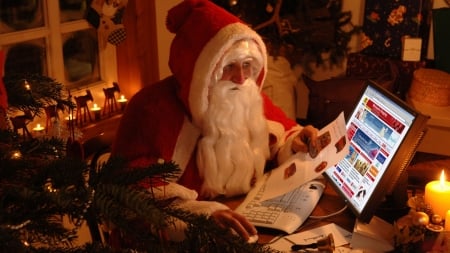 Santa Using Technology. . - santa, holidays, computer, technology, christmas