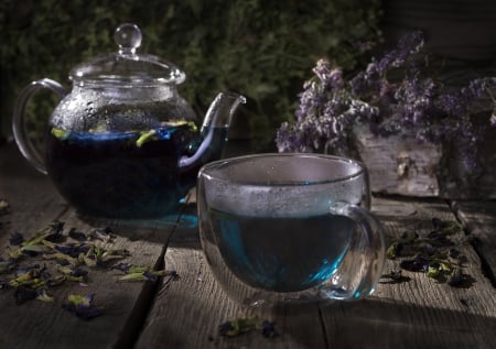 Blue tea - table, night, flowers, pot, cup