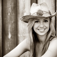 Smiling Cowgirl . .