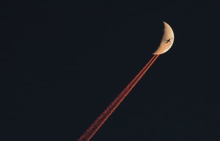 Plane Crossing a Crescent Moon - space, aircraft, moon, fun, commercial, cool