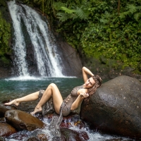 Stacy Cruz at a Waterfall
