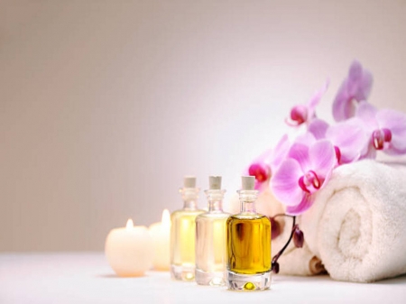 Aromatherapy oil - candles, orchids, oil, towel