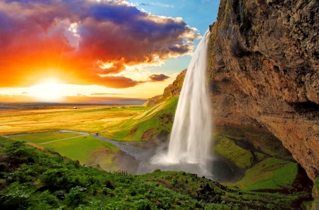 Seljalandsfoss waterfall - sky, iceland, clouds, beautiful, sunset, waterfall, rocks, exotic