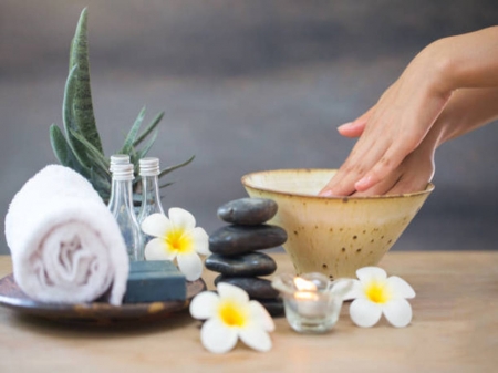 Spa accessories - oil, hands, candles, spa, flowers