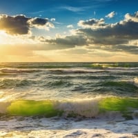 Sea Waves at Sunrise