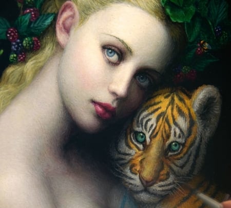 Girl and tiger cub